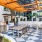 Apartments in Downtown Savannah - Olmsted Savannah - BBQ Area with Grill, Tables, Chairs, and Sun Shade