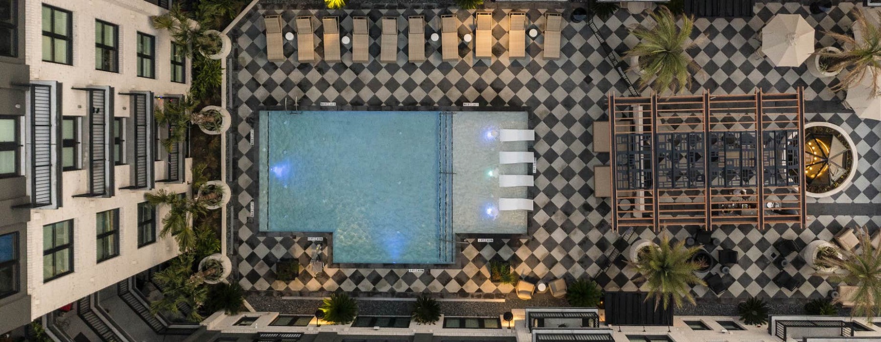 Luxury Pool with in pool seating and nearness to apartments