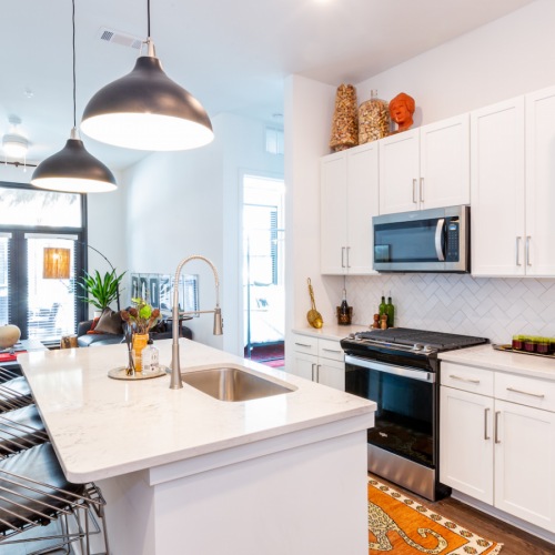 Your Home – Gas Ranges, Carrera Quartz Countertops & Shaker Cabinets Your Home – Gas Ranges, Carrera Quartz Countertops & Shaker Cabinets