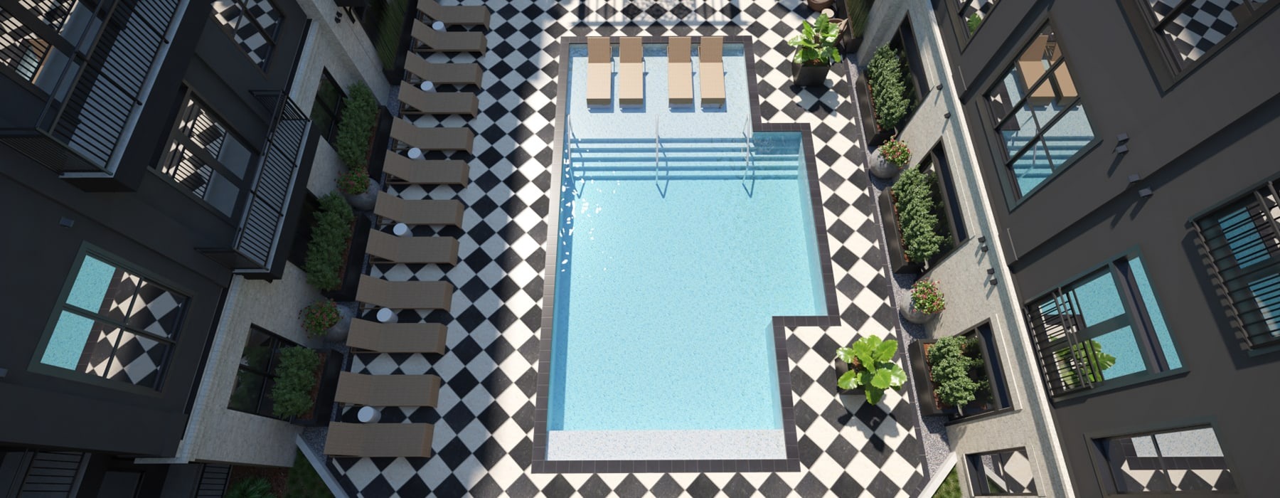 aerial view of swimming pool showing spacious seating and easy access to apartment homes